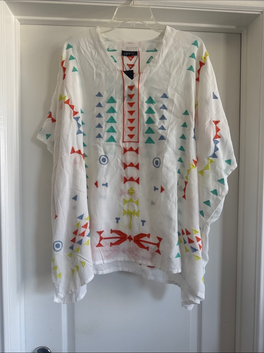 Embroidered White Women’s Top with Multicolor Geometric Accents